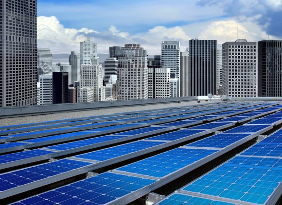 Solar panels installed on a building rooftop by Solar Lights & More in Ocala, FL