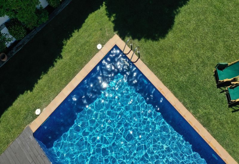 Top View of a Swimming Pool Heated Year-Round With Solar Pool Heaters