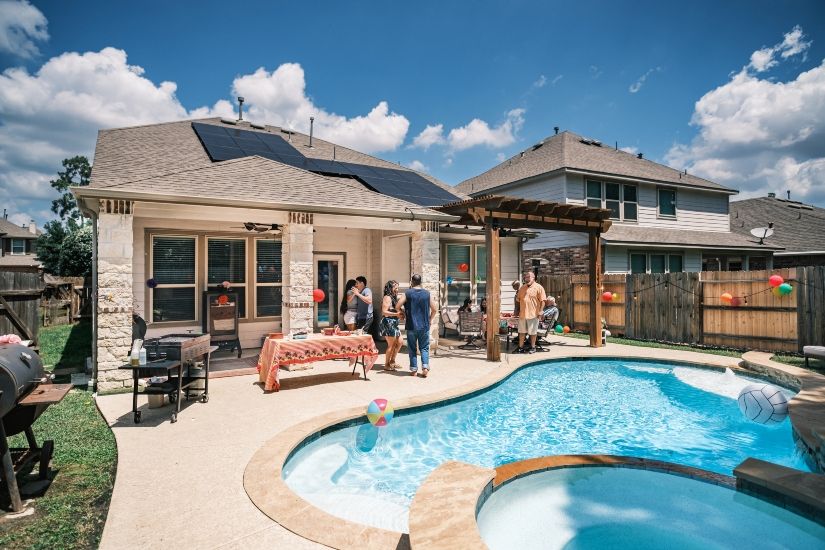 A Family Having a Party in the Backyard of a House in Leesburg, FL